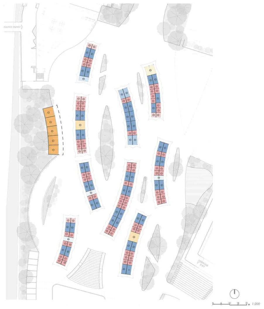Typical bazaar stall layout: colour-coded stall runs curving across the paved ground between planting